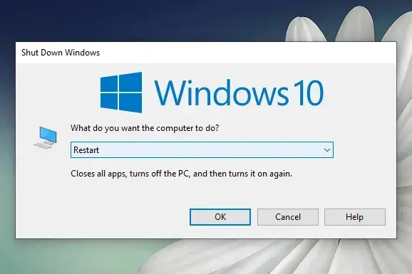 Windows 10 shutdown dialog box with the option to restart selected.